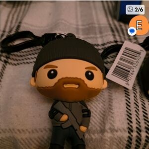 Netflix Character Keychain with Black and Brown Accents